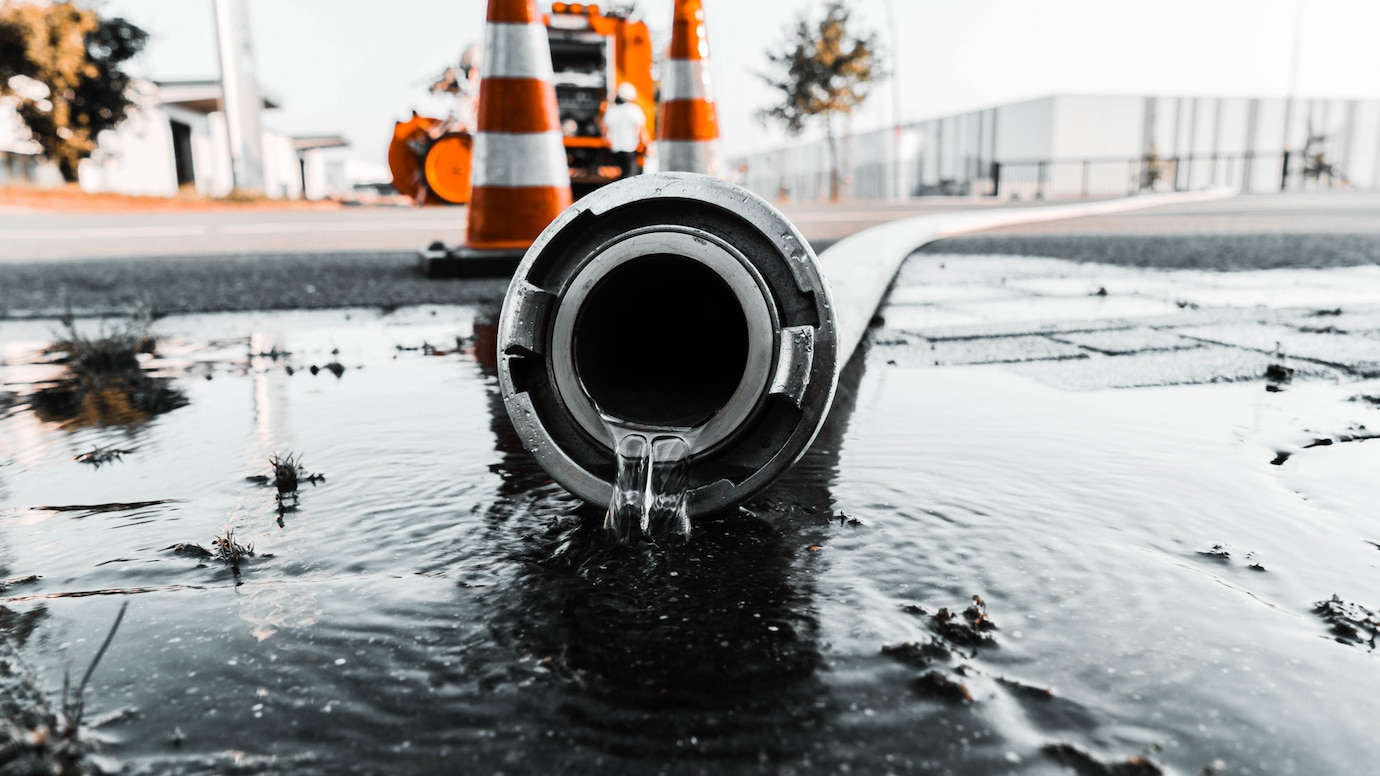 gray pipe with water coming out its hole_181624 4705